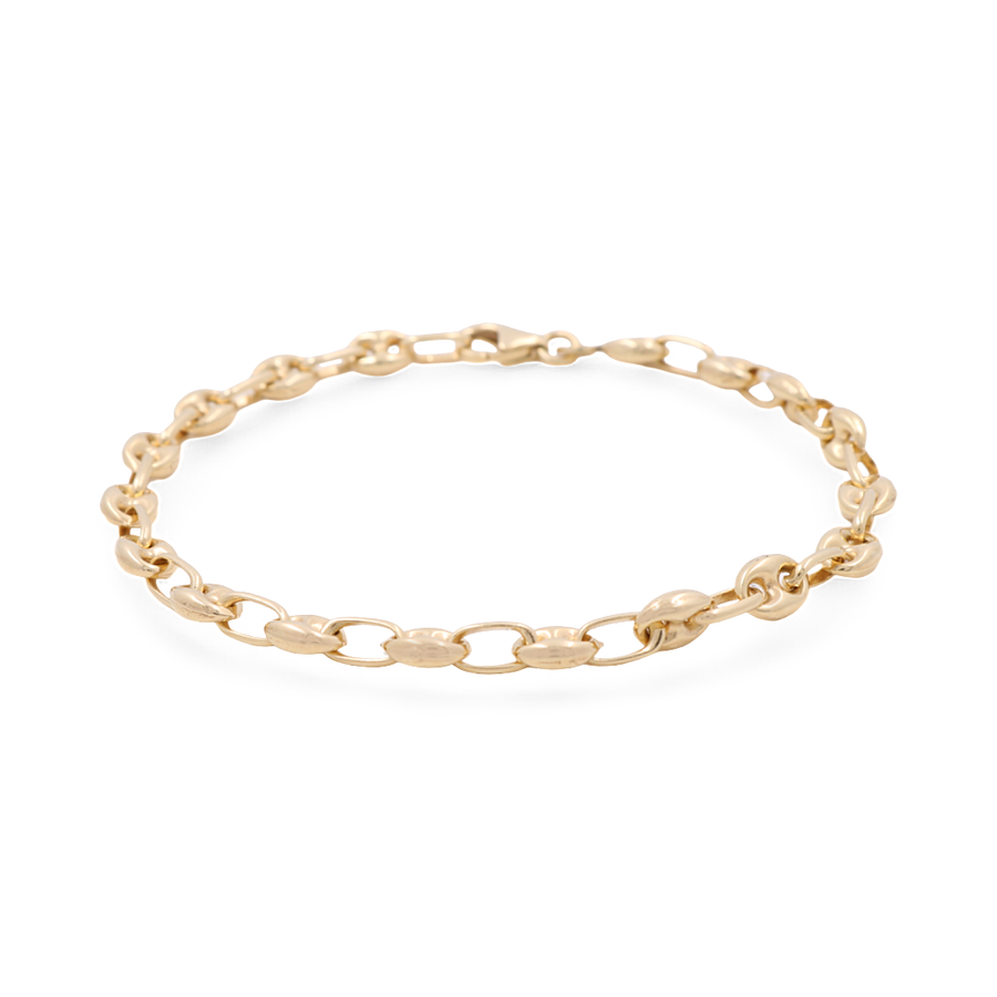 The 14K Yellow Gold Women's Fashion Italian Link Bracelet by Miral Jewelry features an elegant oval chain design and a small clasp, making it a stylish and sophisticated accessory.