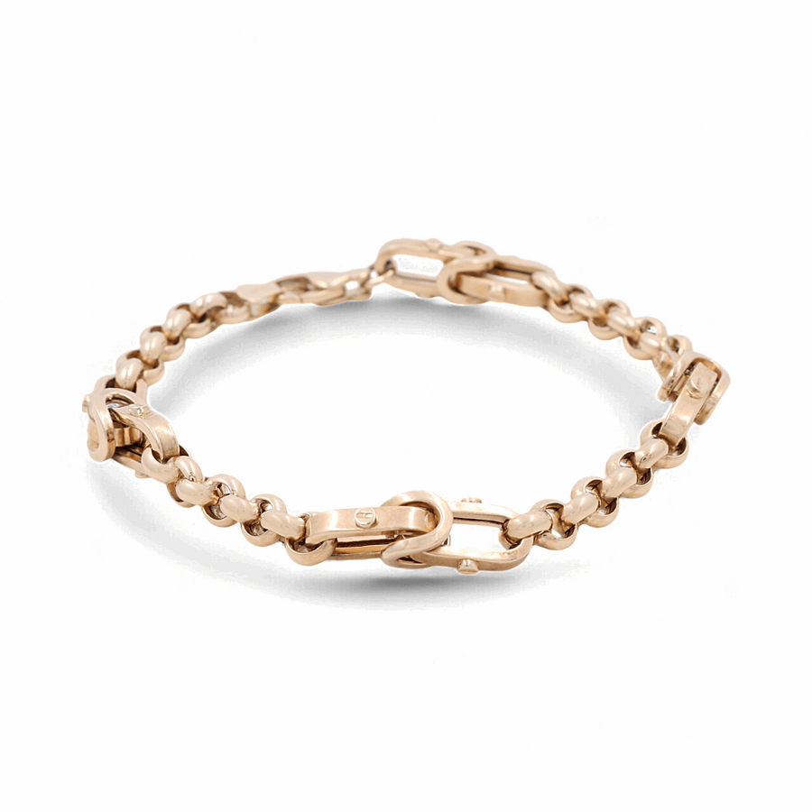 A fine jewelry piece from Miral Jewelry, the 14K Yellow Gold Fashion Links Bracelet features a clasp and alternating oval and round fashion links.