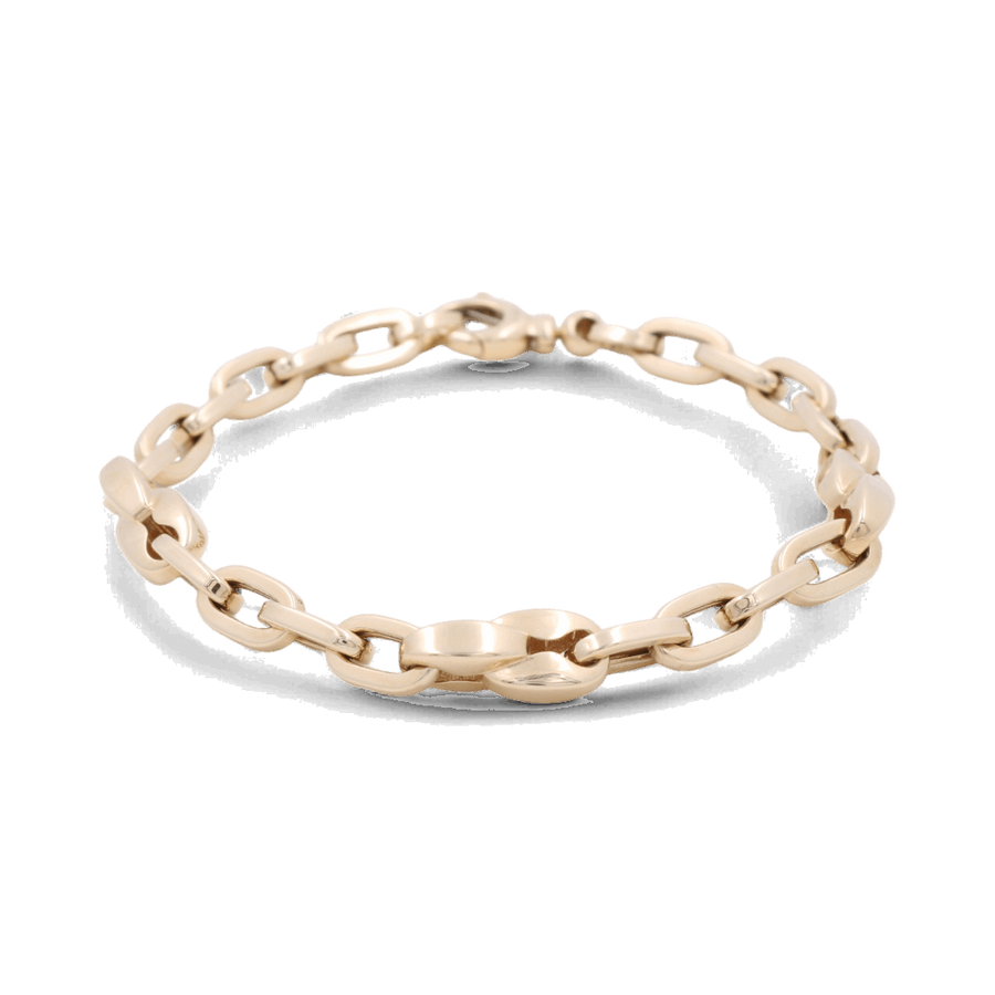 The 14K Yellow Gold Fashion Links Bracelet from Miral Jewelry features a sophisticated design with oval-shaped links arranged in a repeating pattern, crafted from luxurious 14K yellow gold.