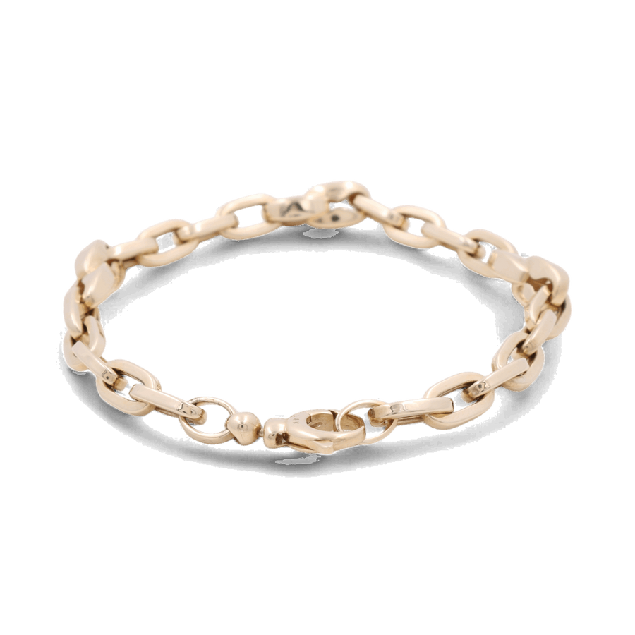 The Miral Jewelry 14K Yellow Gold Fashion Links Bracelet, featuring large interlocking links and a lobster clasp, offers a sophisticated look.