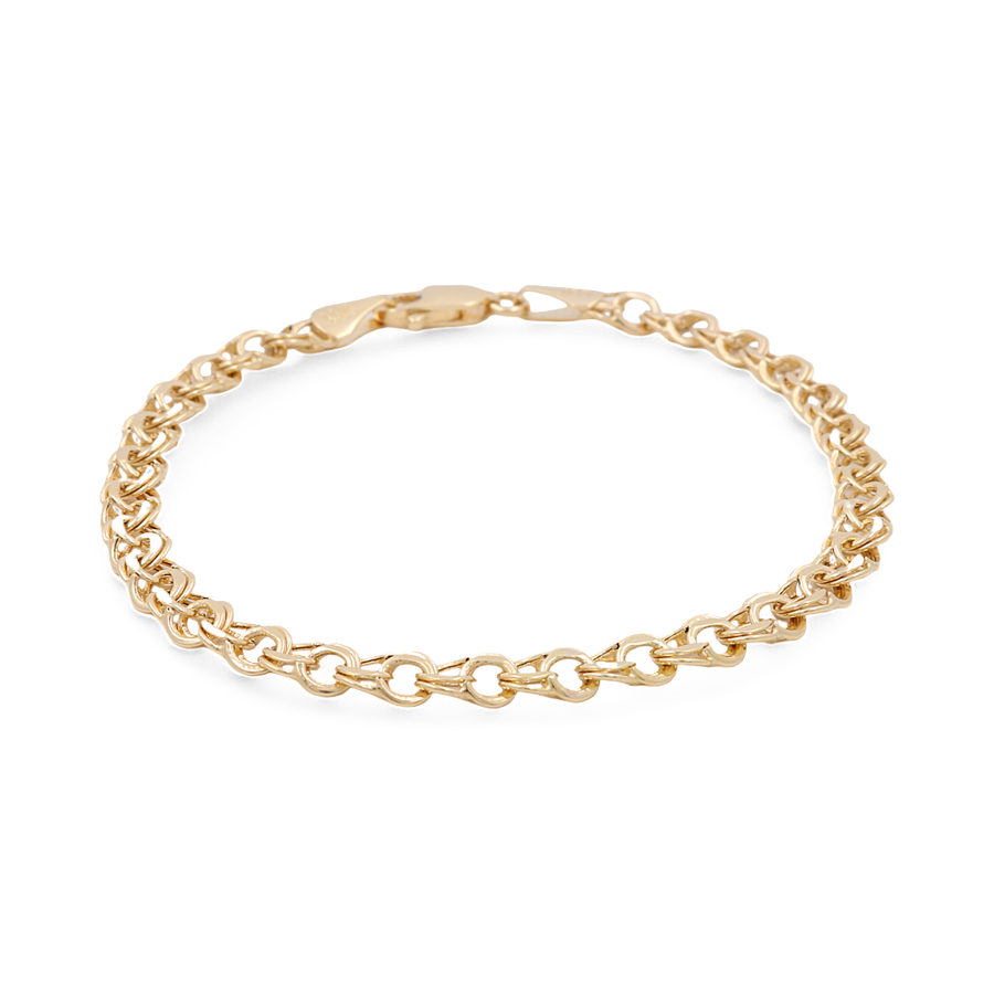 A must-have for any jewelry lover, the Miral Jewelry 14K Yellow Gold Women's Fashion Links Bracelet features interlocking oval and heart-shaped links with a convenient lobster clasp closure.