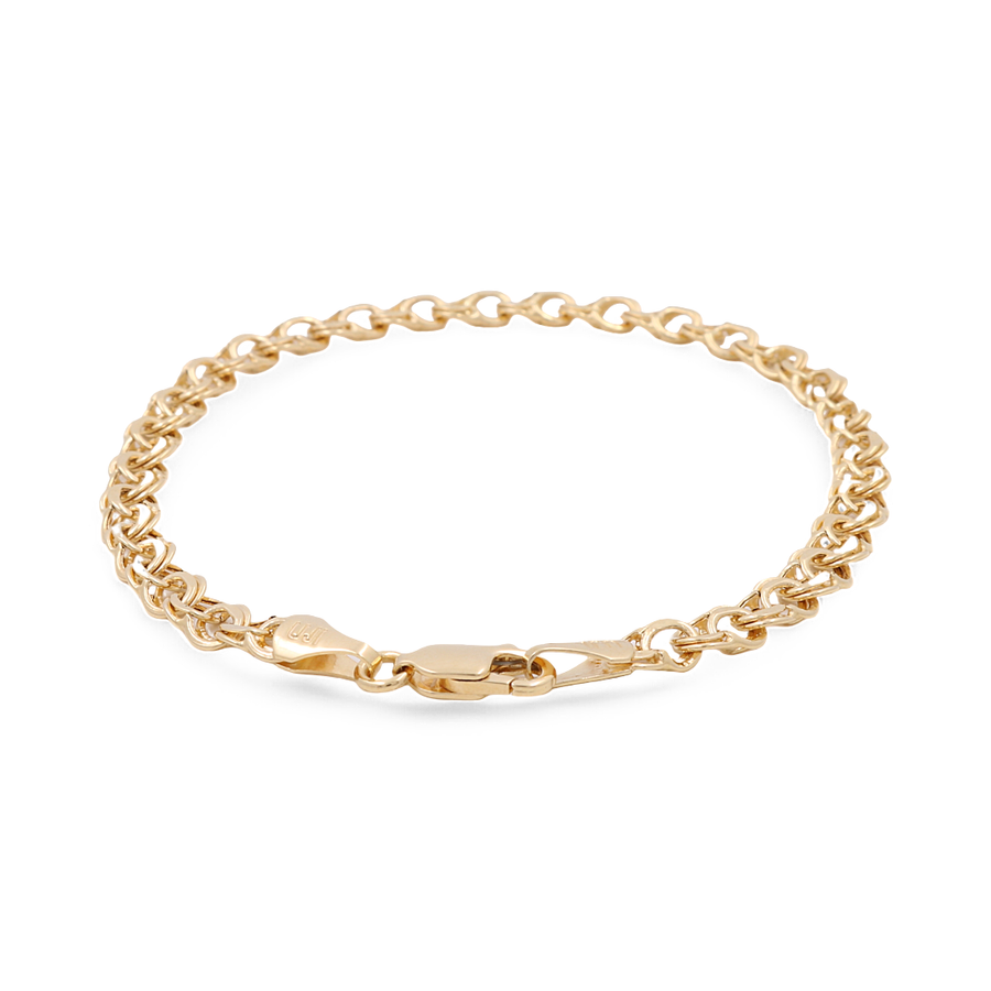 A must-have for any jewelry lover, the 14K Yellow Gold Women's Fashion Links Bracelet by Miral Jewelry is elegantly crafted from 14K yellow gold and features a secure lobster clasp closure.