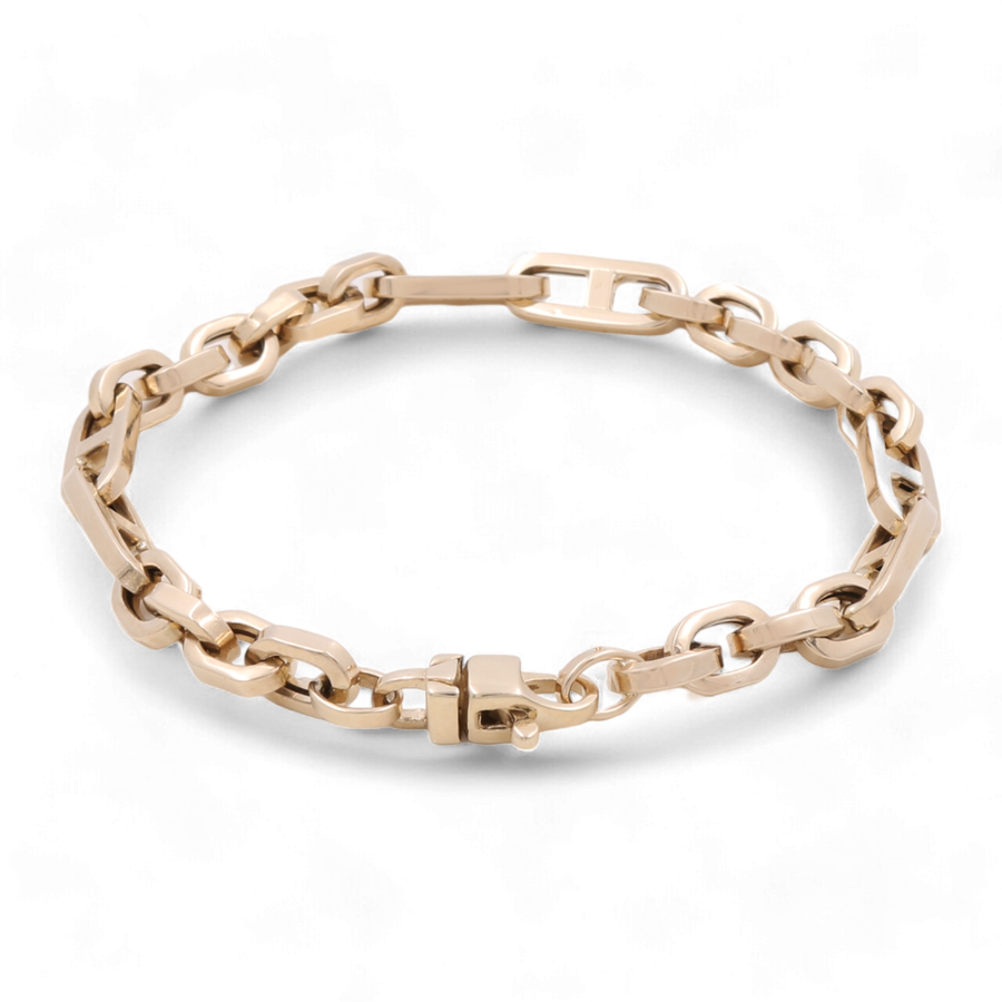 The 14K Yellow Gold Fashion Links Bracelet by Miral Jewelry exudes timeless elegance with its interconnected links and secure clasp.