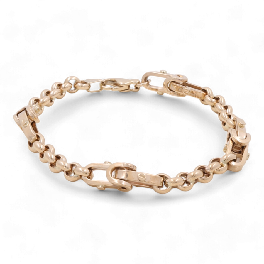 The 14K Yellow Gold Fashion Italian Link Bracelet by Miral Jewelry features a combination of chain links and rectangular elements, along with a clasp closure—this exquisite piece is the perfect fashion accessory.