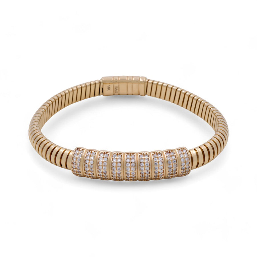 A 14K gold fashion bracelet by Miral Jewelry, featuring a segmented design and a central section adorned with nine rows of small, clear cubic zirconias.