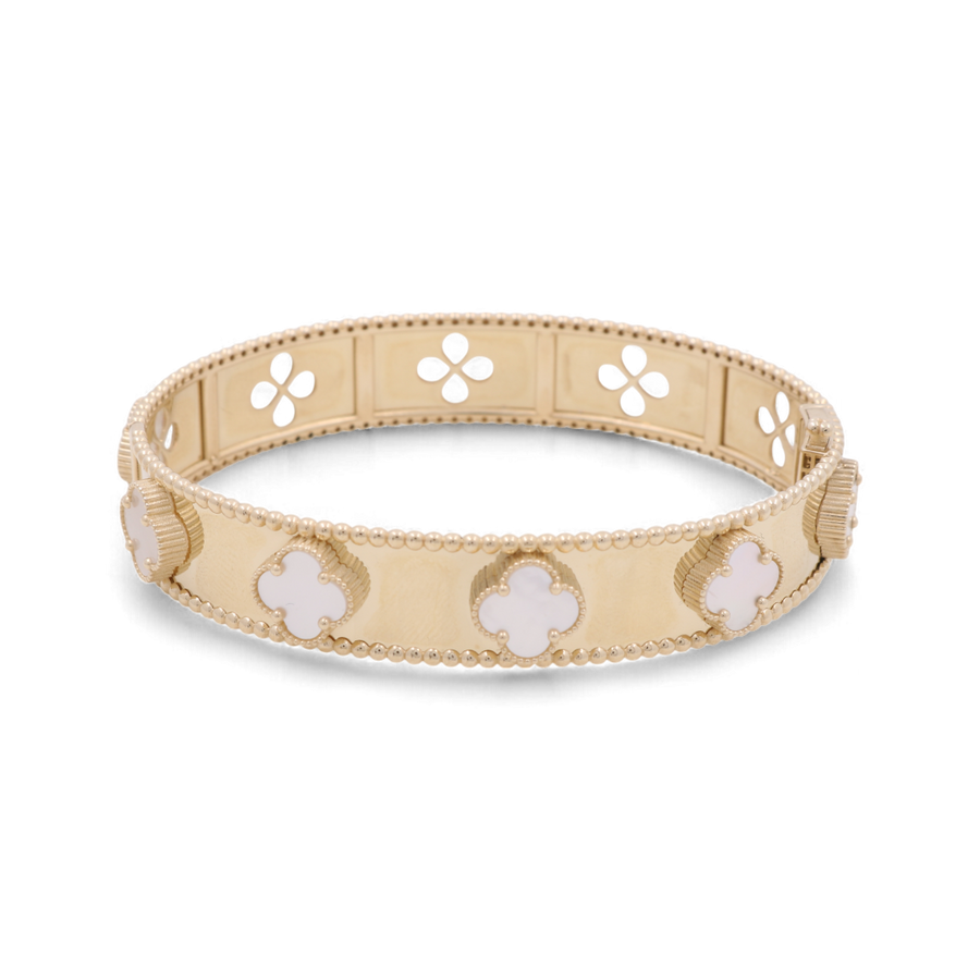 The 14K Yellow Gold Fashion Flower Women's Mother of Pearl Bracelet by Miral Jewelry showcases floral and beaded designs with mother of pearl accents and cut-out flower shapes along the band.