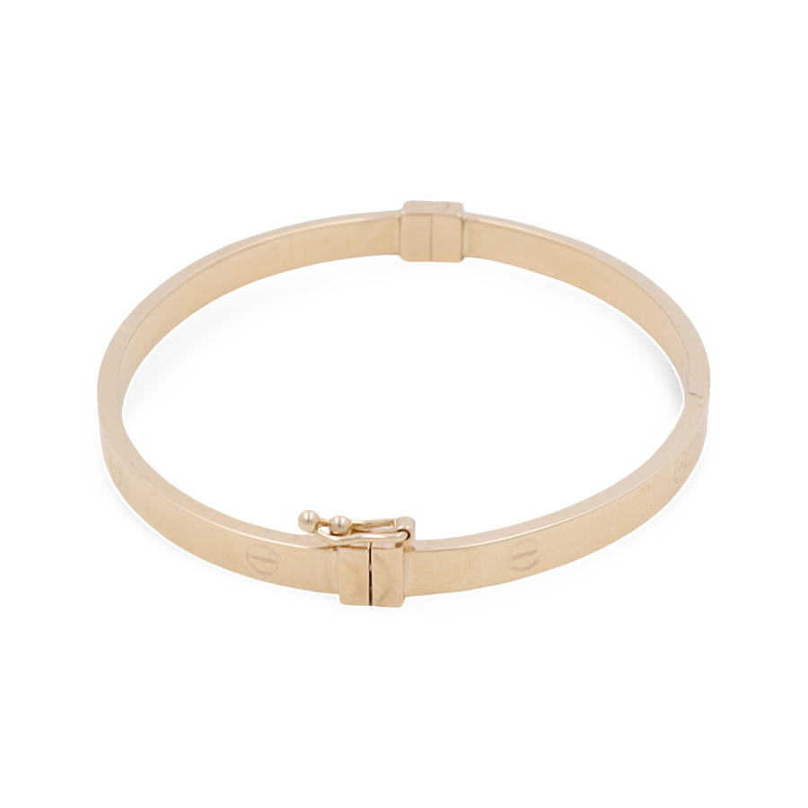 Miral Jewelry presents the 14K Yellow Gold Women's Fashion Bangle Bracelet, a stunning accessory with a flat design and secure clasp closure that epitomizes women's fashion jewelry in 14k gold.