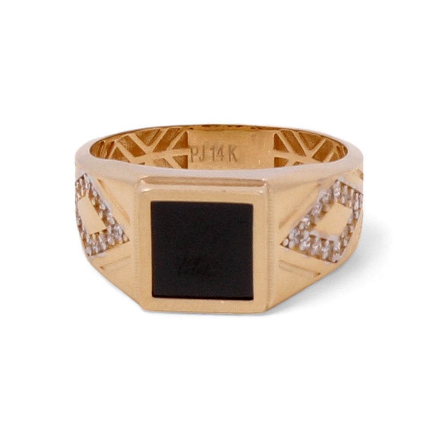 Men’s **14K Yellow Gold Men Ring with Onyx Stone** by **Miral Jewelry** featuring a striking black onyx stone in the center, flanked by intricate diamond patterns on both sides, inscribed with "PJ14K" on the inner band.