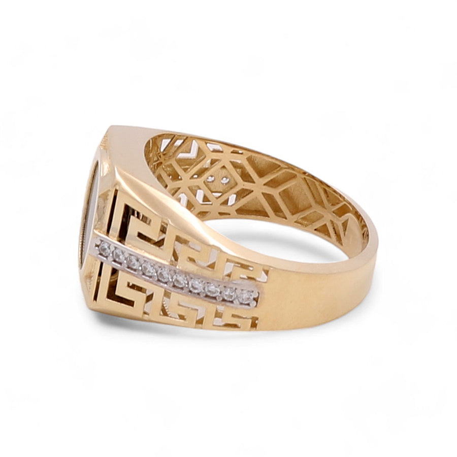 A Miral Jewelry 14K Yellow Gold Men Ring with Onyx Stone and Cubic Zirconias featuring an intricate geometric openwork design, accented with a row of small cubic zirconias on one side.