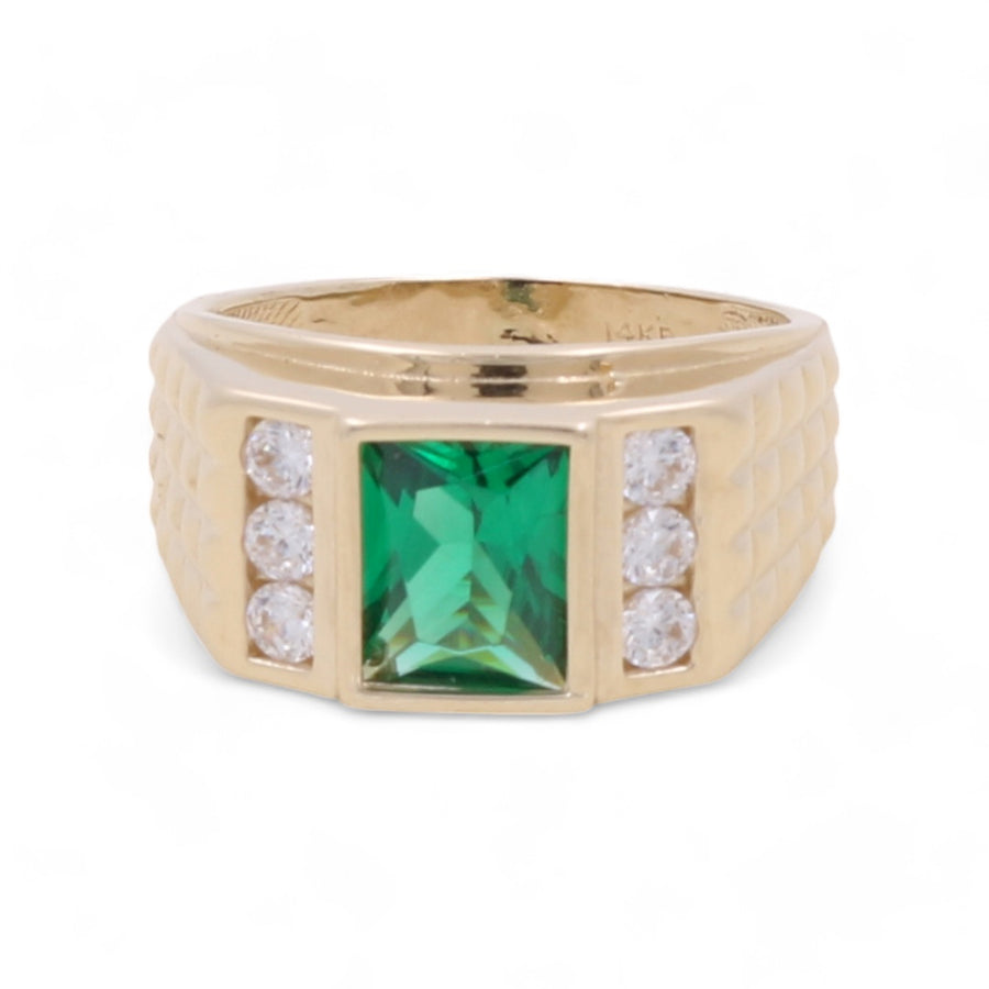 Miral Jewelry's 14K Yellow Gold Men's Emerald and Cubic Zirconias Ring features a large square green gemstone in the center, flanked by three smaller round cubic zirconias on each side.