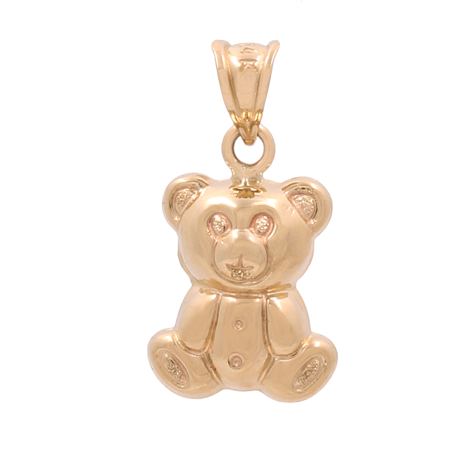 Introducing the 14K Yellow Gold Fashion Teddy Bear Pendant from Miral Jewelry – a charming pendant featuring intricate details and a bail at the top for easy attachment to any chain. This exquisite 14K yellow gold piece is an elegant accessory that adds sophisticated charm to any outfit.