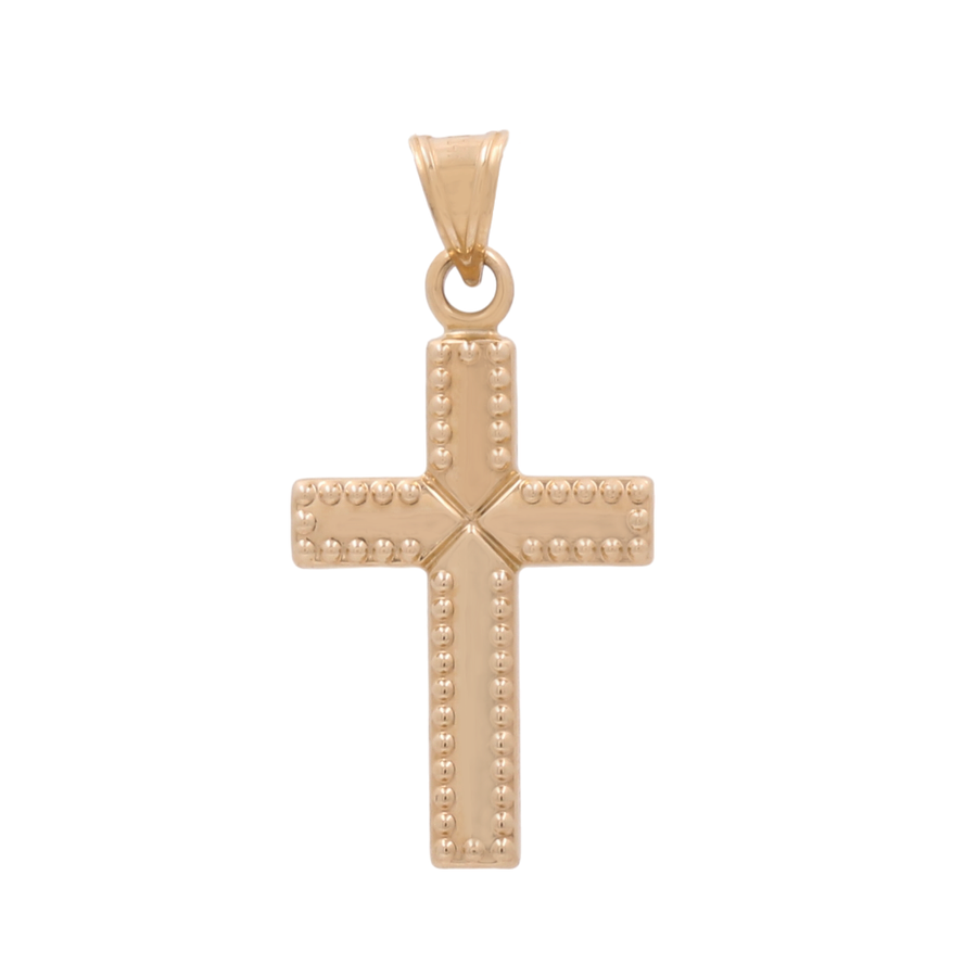 The 14K Yellow Gold Fashion Cross Pendant by Miral Jewelry showcases intricate dotted detailing and a convenient loop at the top for attaching to a chain, all crafted in stunning 14K yellow gold.