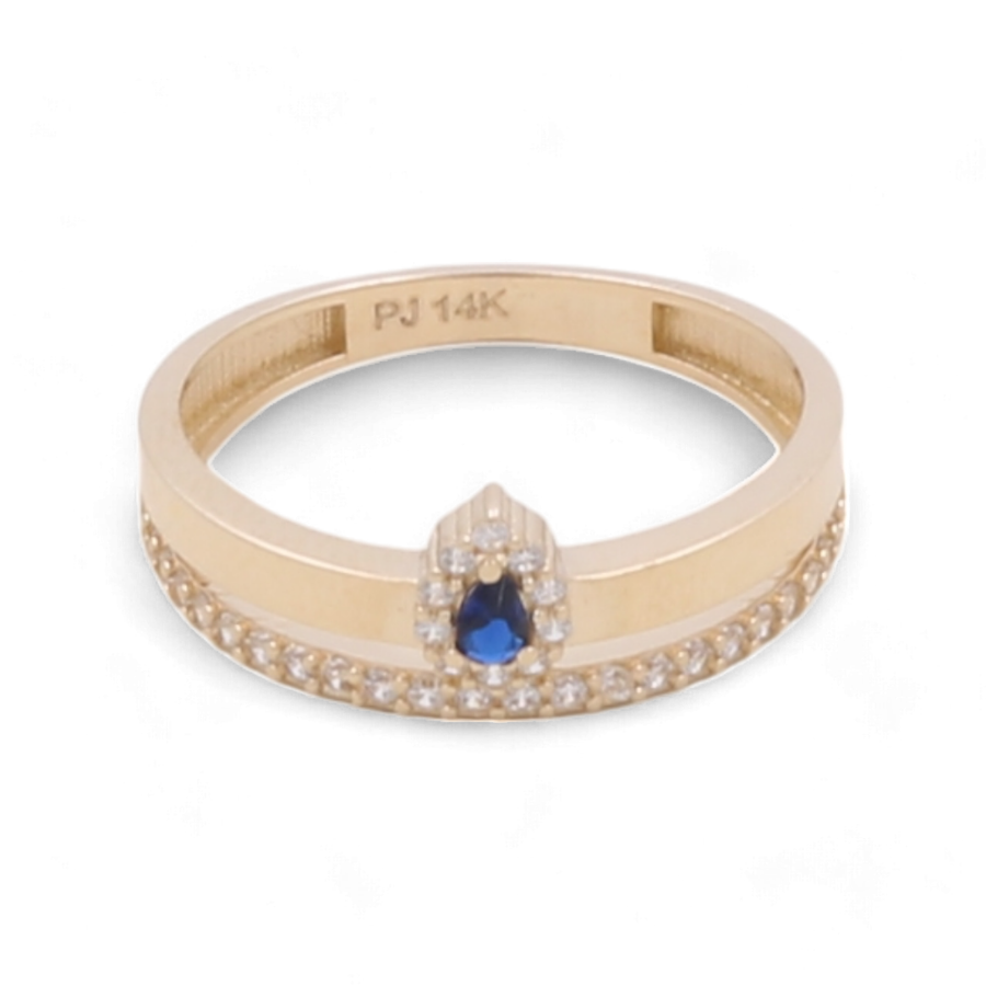 A luxurious 14K Yellow Gold Women's Fashion with Color Stone Ring by Miral Jewelry, featuring a stunning blue gemstone and small diamonds embedded in its band, engraved with "PJ 14K".