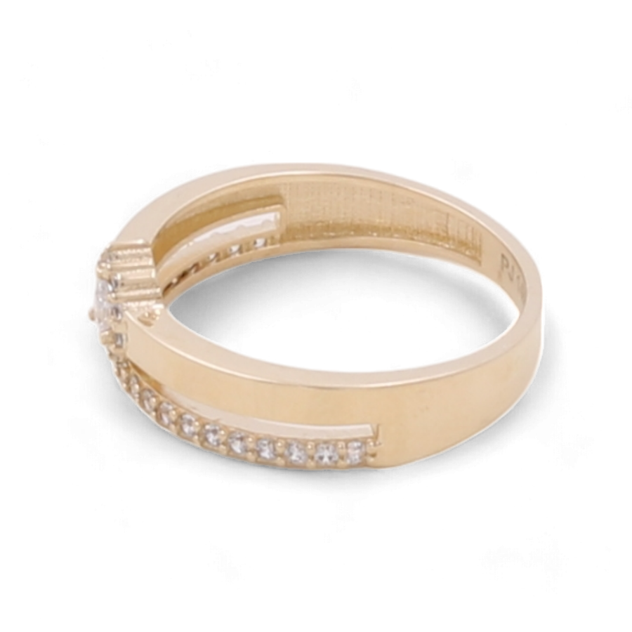 Miral Jewelry's 14K Yellow Gold Women's Fashion Ring features a row of small cubic zirconias set along the band and a stunning larger cubic zirconia cluster on one side.