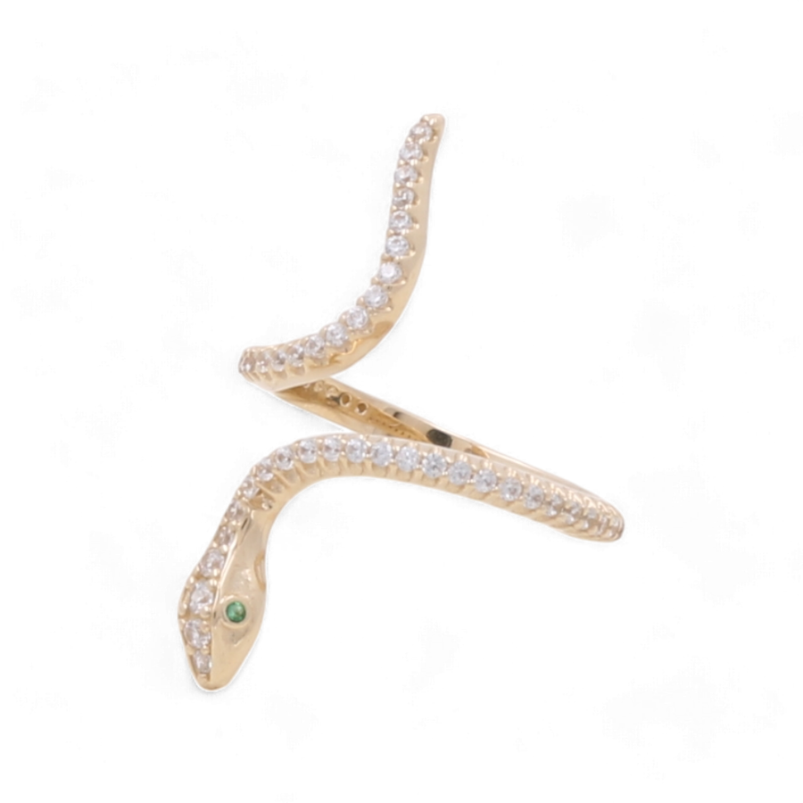 The 14K Yellow Gold Women's Snake with Color Stone Ring by Miral Jewelry is shaped like a serpent, adorned with small diamonds and cubic zirconias, and features an emerald eye on a white background.