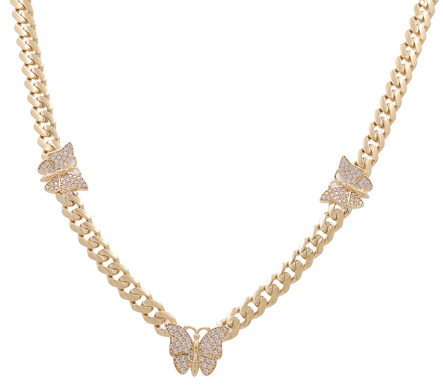 A 14K Yellow Gold Fashion Butterflies Necklace with Cubic Zirconias by Miral Jewelry featuring three butterfly pendants encrusted with small white cubic zirconias.