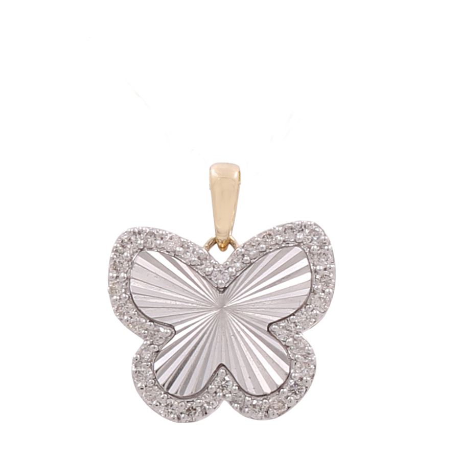 Presenting the 10k White and Yellow Gold Diamond Butterfly Women's Pendant by Miral Jewelry – a stunning piece that beautifully integrates a gold attachment with a textured silver body, adorned by a delicate border of small, clear gemstones. This exquisite women's jewelry piece is crafted in 10k white gold, making it an elegant and radiant addition to any collection.