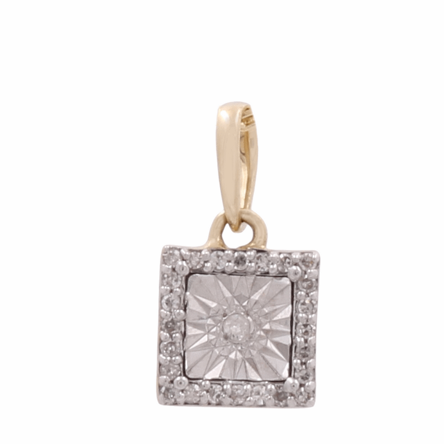 A 10k yellow gold women's pendant by Miral Jewelry, featuring a central geometric design surrounded by small, clear stones with a square diamond loop for attachment.