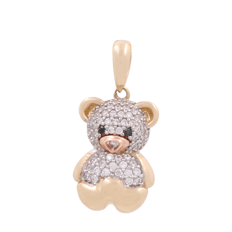 A 14K yellow gold bear-shaped women's pendant featuring cubic zirconia and black details for the eyes with a pink detail for the nose, available at Miral Jewelry.