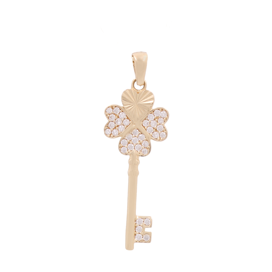 Introducing the 14K Yellow Gold Key Treble Heart Women's Pendant with Cz by Miral Jewelry, a luxurious and elegant piece adorned with small Cubic Zirconias.