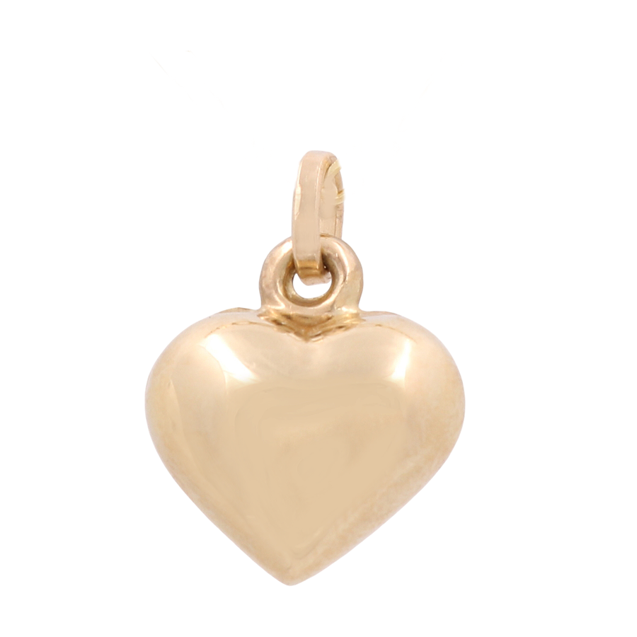 The 14K Yellow Gold Fashion Heart Pendant by Miral Jewelry features a small hoop at the top, perfect for attaching to a necklace or bracelet—an elegant accessory for any occasion.