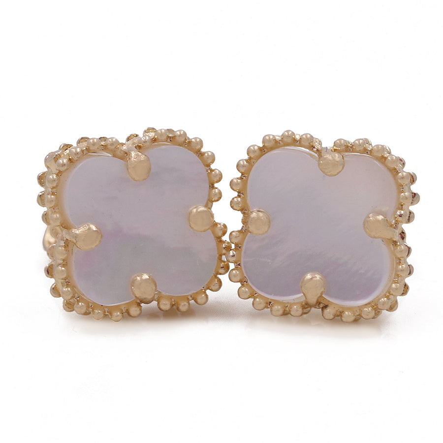 A pair of Miral Jewelry 14K Yellow Gold Fashion Flower Women's Mother of Pearl Earrings with a four-leaf clover design, featuring mother of pearl centers and 14K yellow gold beaded edges.