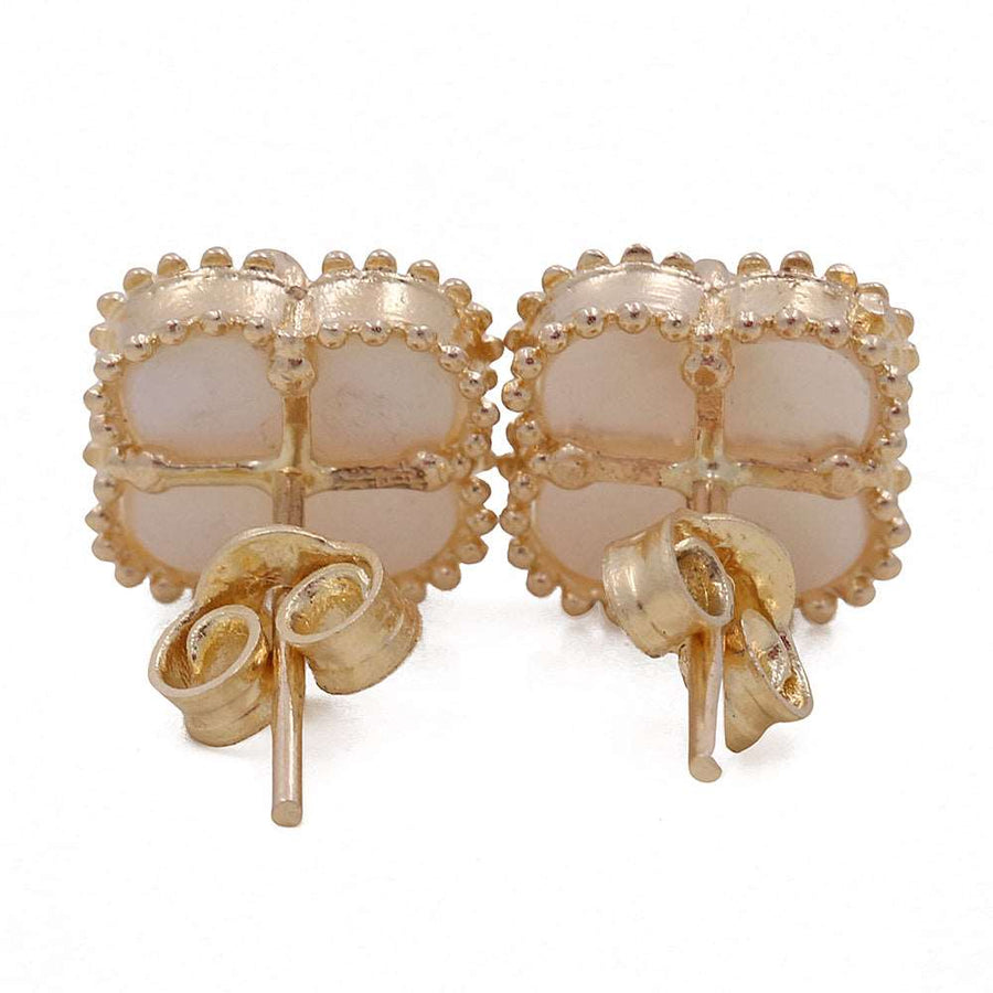 14K Yellow Gold Fashion Flower Women's Mother of Pearl Earrings by Miral Jewelry, shown with butterfly backings on a white background.