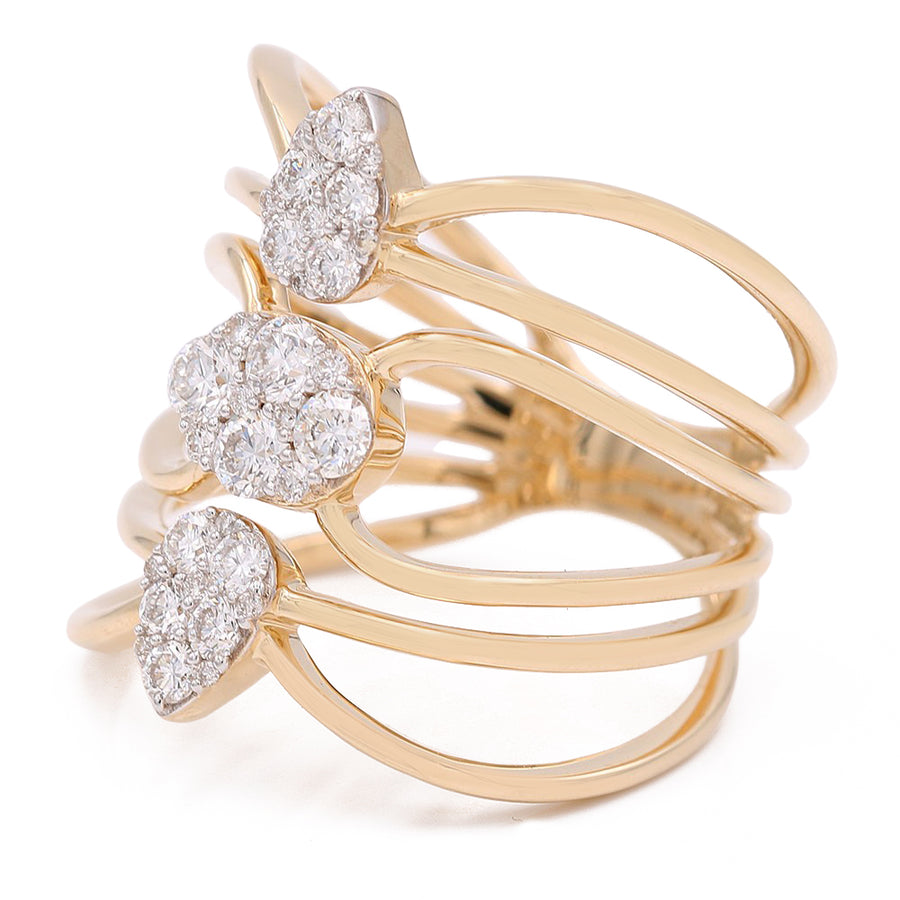 Introducing the Yellow Gold 14k Fashion Ring With Diamonds by Miral Jewelry: a stunning piece featuring three heart-shaped sections encrusted with small diamonds, perfect as a women's yellow gold fashion ring.